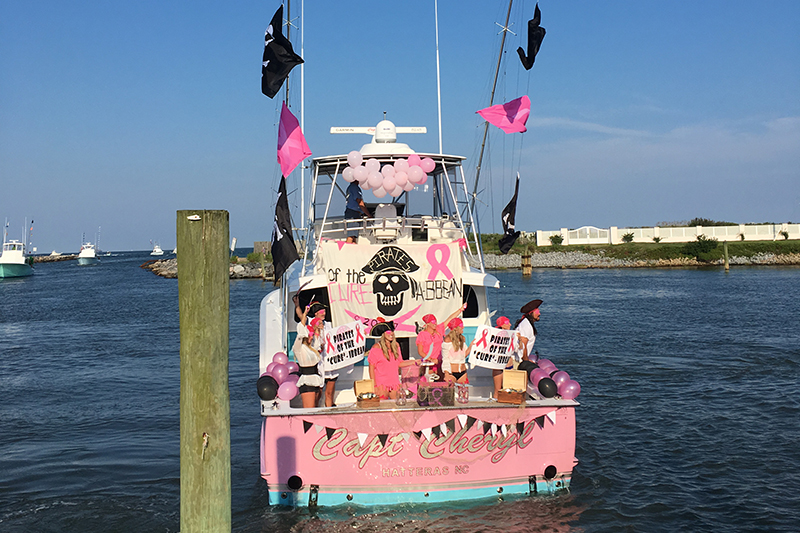 Boat decorated as baby shark in the water