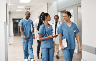 Doctors and nurses walking together in the hospital.
