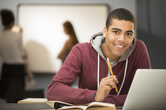 Image of a student working on a computer