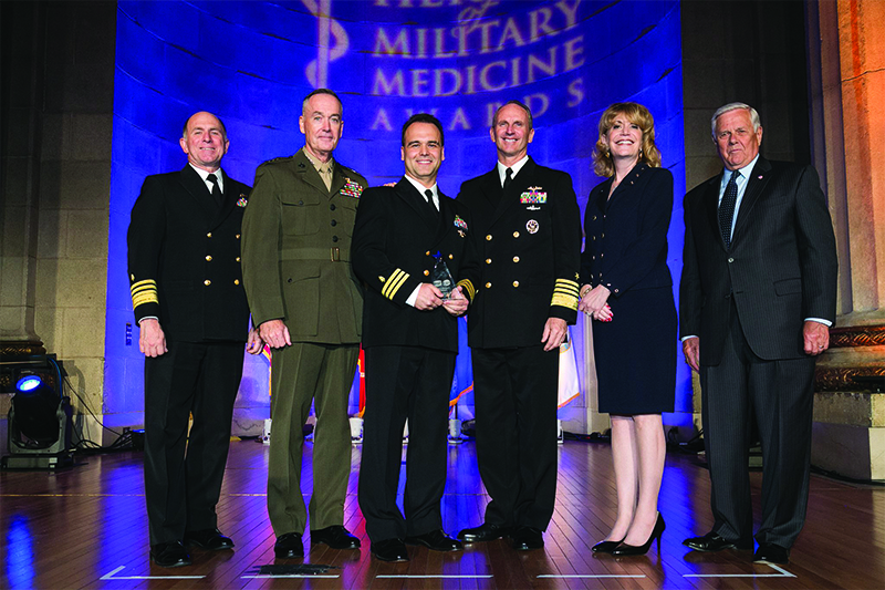 ‌Cmdr. Darian C. Rice, MD (’99), Chief of Cardiothoracic Anesthesia and the Director of the Anesthesia Residency Program at the Naval Medical Center Portsmouth, receiving the 2015 Hero of Military Medicine by the Center for Public-Private Partnerships at the Henry M. Jackson Foundation for the Advancement of Military Medicine, Inc. (HJF). 