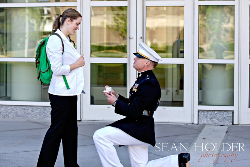 Marine on knee proposing to PA student on EVMS campus.
