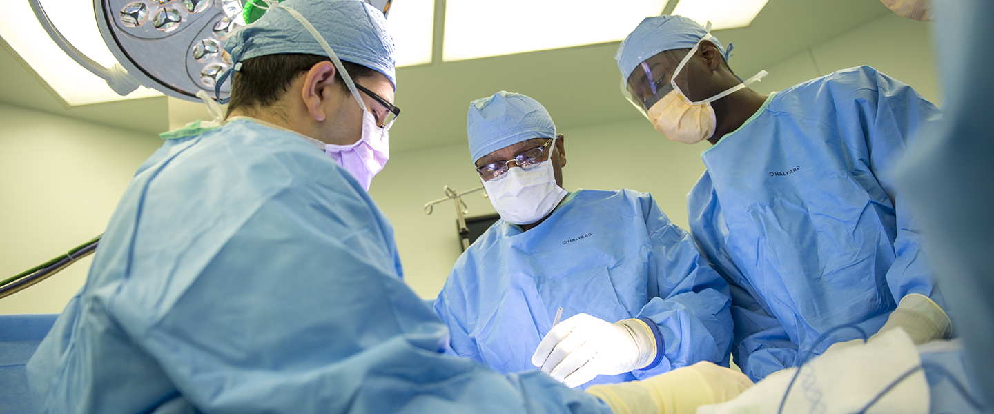 Dr. Britt and colleagues in surgery on an acute surgery case