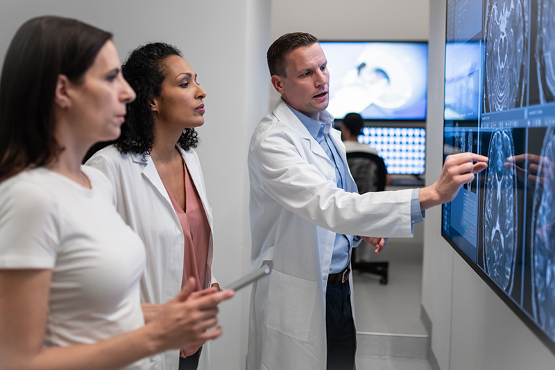 group of health professionals looking at screen