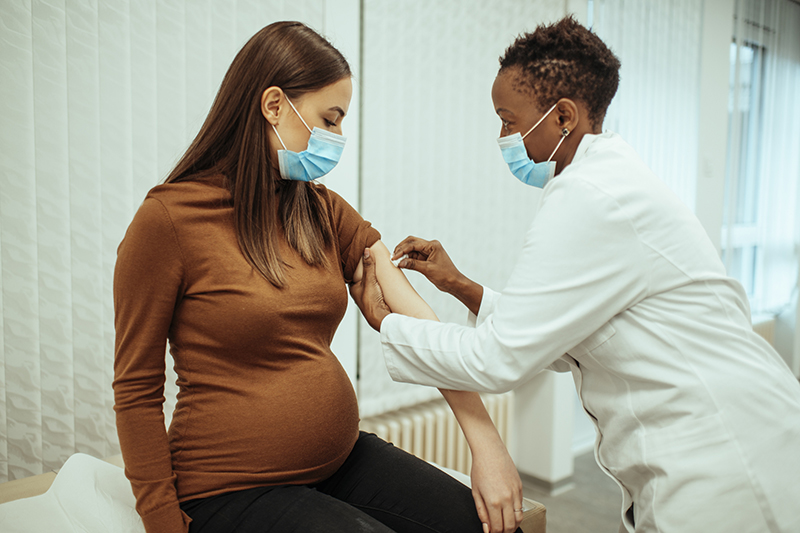 pregnant woman getting vaccine
