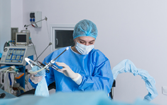 Doctor holding hysteroscopy instrument