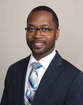 Alumni Wesley Mitchell in suit professional photo