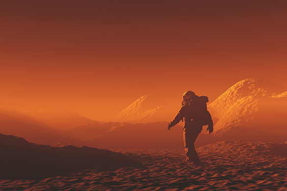 Astronaut walking on the surface of mars with mountains in the distance and a red sky