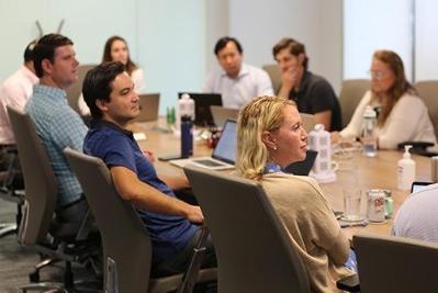 Group gathered around a conference table