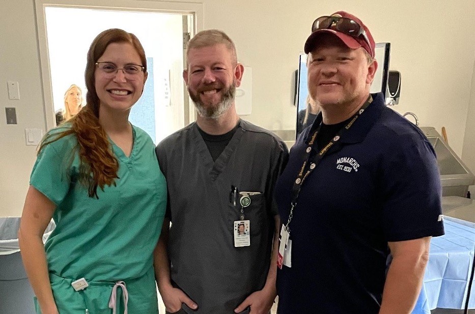 Three Emergency Medicine docs smile at the camera