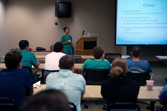 An Emergency Medicine resident presents research.