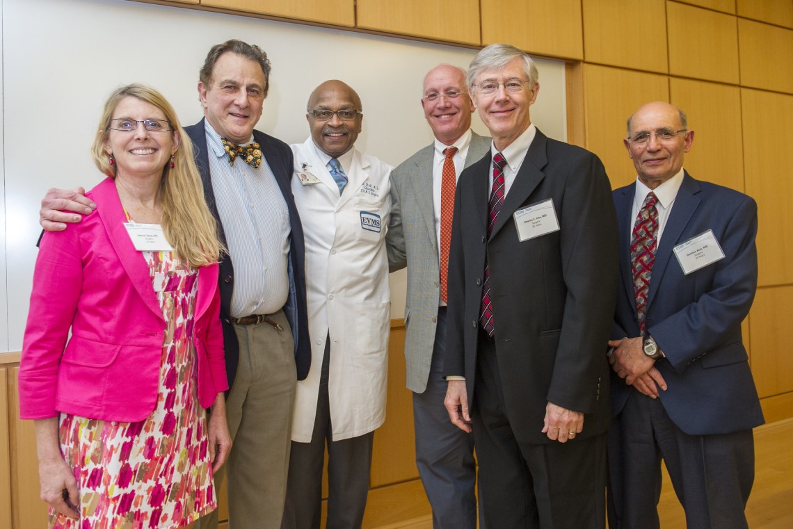 Community faculty members pose for a photo with EVMS' Dr. L.D. Britt