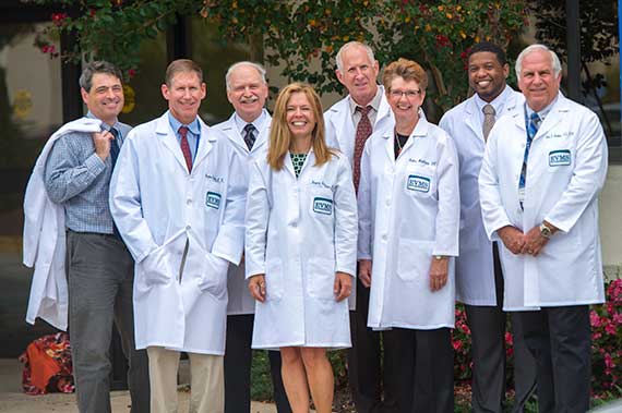 Portsmouth Family Medicine physicians pose for a group photo.