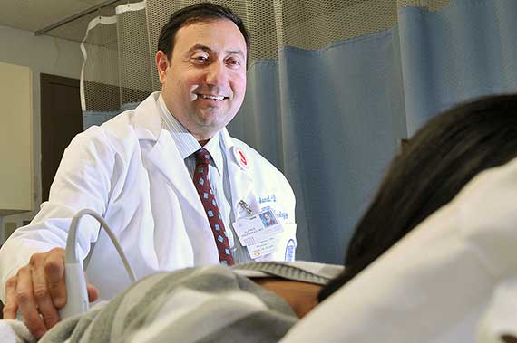 Dr. Alfred Abuhamad performs an ultrasound.