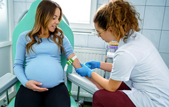 Pregnant woman getting a blood test