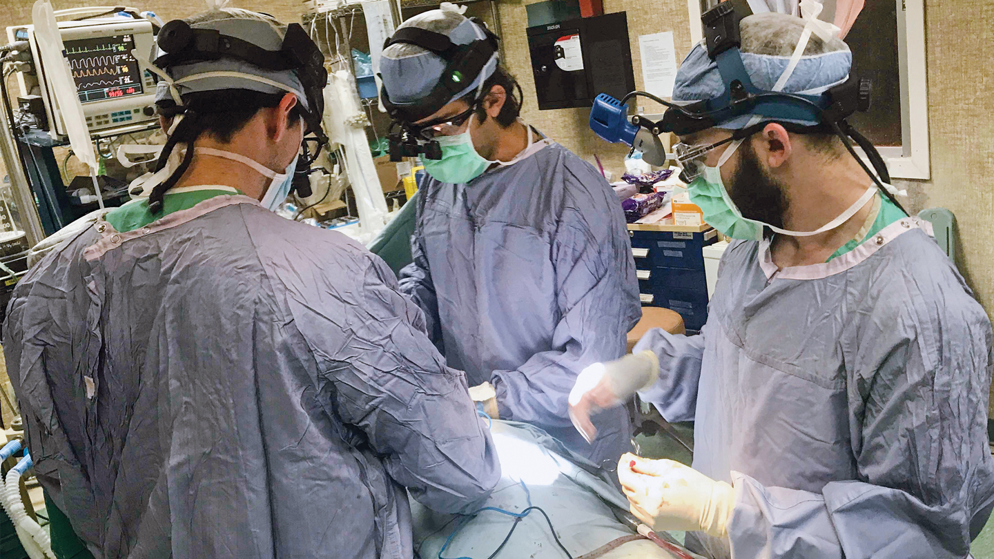 Surgeons in operating room