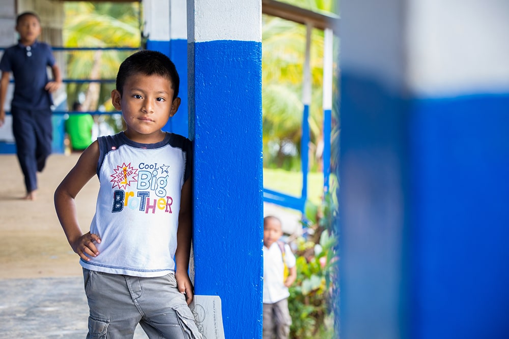 Young Panamanian boy poses to have his picture taken.