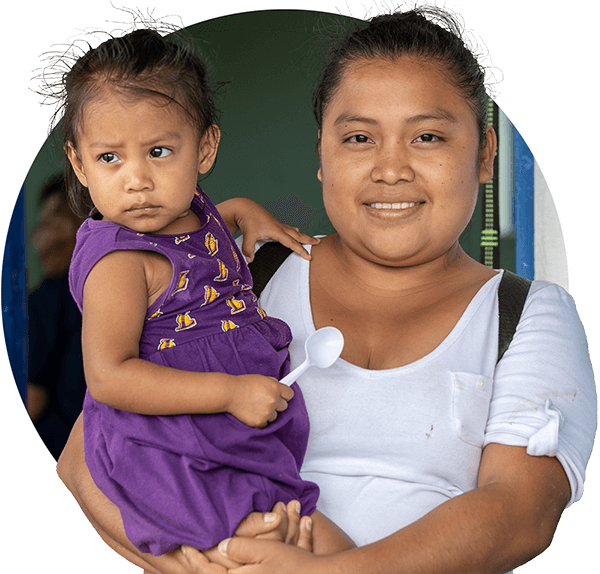 Daris Beth, a 28-year-old Panama City resident, pictured holding her daughter