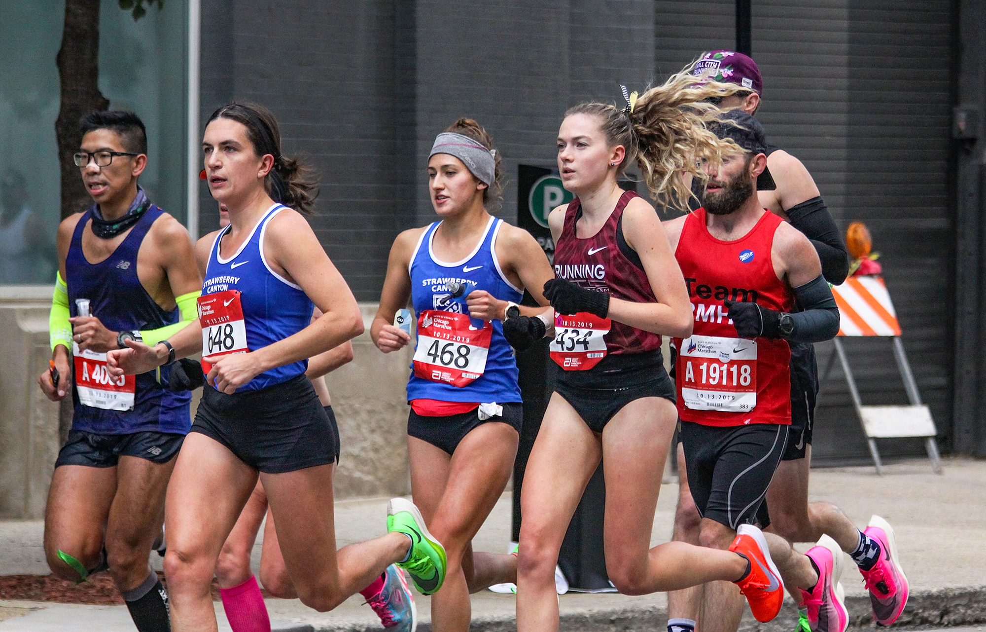 A still of Megan Cunningham running mid race.