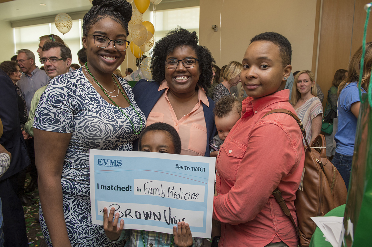 A fourth-year EVMS medical student celebrates with her family at Match Day 2019.