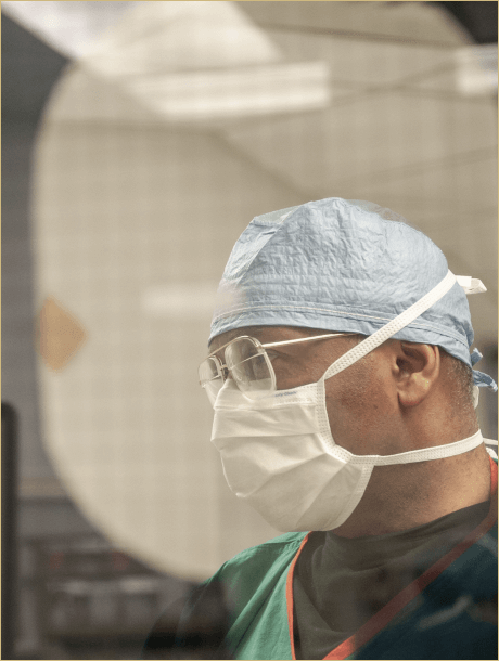Dr. Britt inside of a hospital setting wearing PPE
