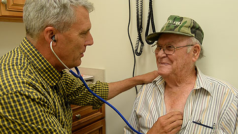 Dr. Marsh examines patient.