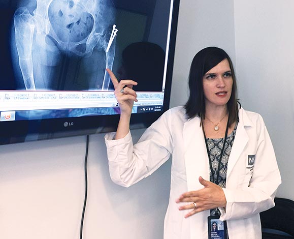 Dr. Alison Boyce lectures with use of an X-ray