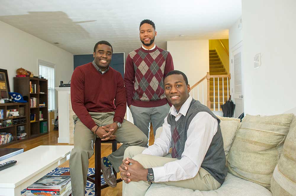 Gerry Ovide, Jelani Williams and Joshua Ononuju in their apartment.