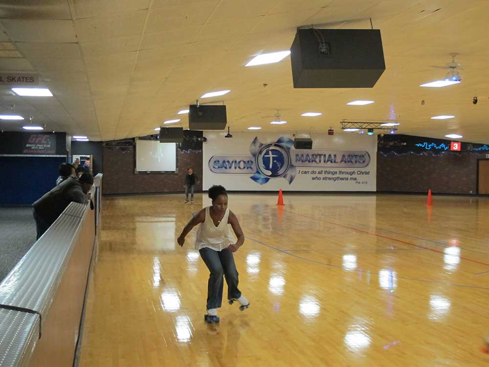 Dr. Salkey skates in the rink by herself.