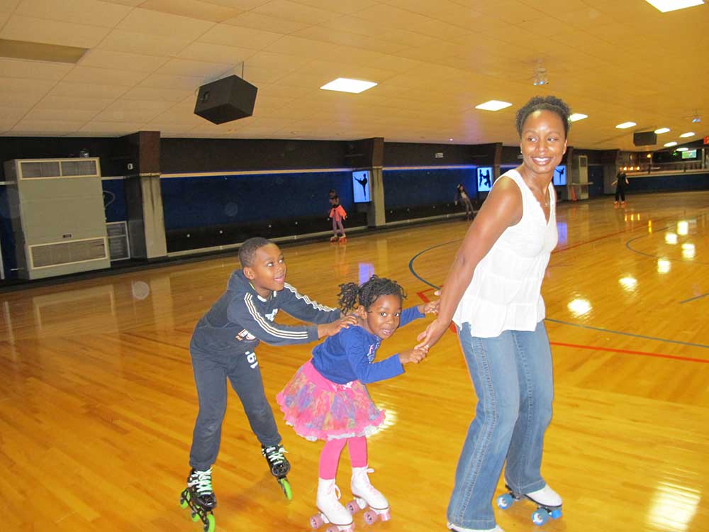 Dr. Salkey skates with her children.